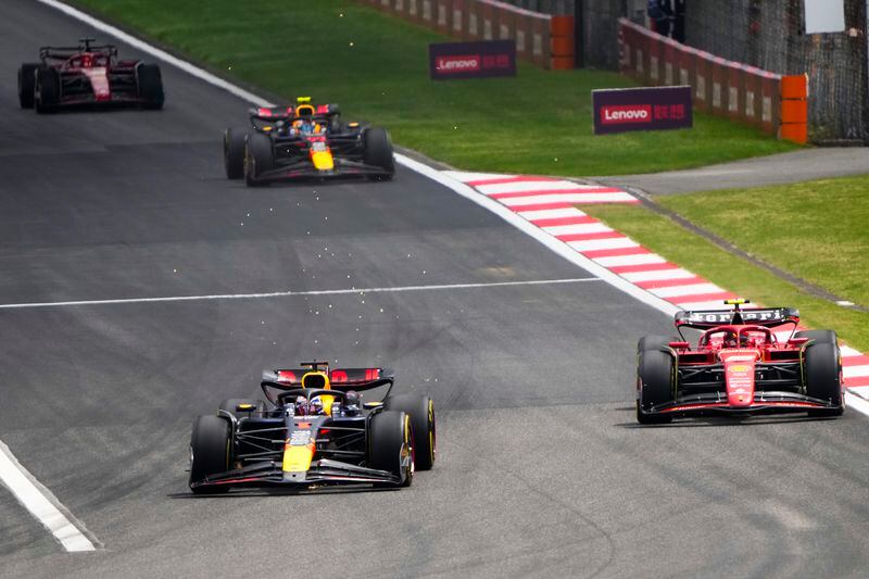 Red Bull driver Max Verstappen of the Netherlands leads Ferrari driver Carlos Sainz of Spain during the sprint race at the Chinese Formula One Grand Prix at the Shanghai International Circuit, Shanghai, China, Saturday, April 20, 2024. (AP Photo/Andy Wong)