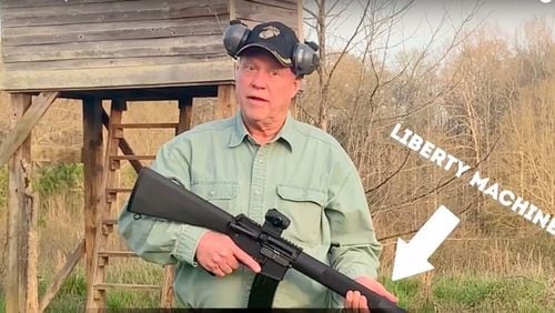 Former congressman Paul Broun and an AR-15, a tool to keep at bay the “looting hordes from Atlanta.” (Screenshot from Broun campaign video)