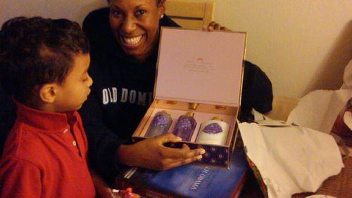 Kisha Holmes and her son, Justin Medina, celebrating Christmas in Virginia in 2009. Holmes killed her three children and took her own life in January 2015.