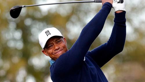 Tiger Woods hits a tee shot on the ninth hole during a practice round for to the Phoenix Open golf tournament on Tuesday, Jan. 27, 2015, in Scottsdale, Ariz. (AP Photo/Rick Scuteri) Tiger Woods is playing his second practice round in Augusta today. (AP photo)