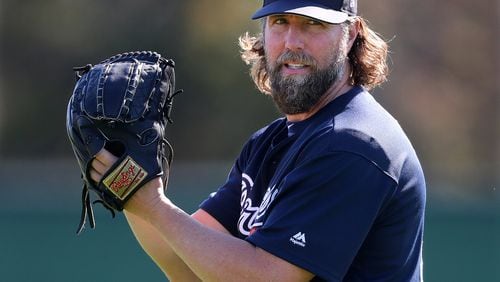 Braves knuckleballer R.A. Dickey, pictured during an early spring-training workout, gave up five runs (two earned) and five hits in three innings of his second start Saturday against the Marlins. (Curtis Compton/ccompton@ajc.com)