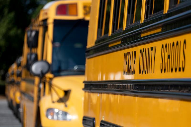 DeKalb County school buses in Stone Mountain on Tuesday, Oct. 10, 2023.   (Ben Gray / Ben@BenGray.com)