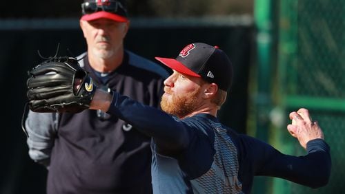 Atlanta Braves new pitching coach Rick Kranitz works with Mike Foltynewicz in the bullpen as pitchers and catchers report for the first day of spring training at the ESPN Wide World of Sports Complex on Friday, Feb. 15, 2019, in Lake Buena Vista.    Curtis Compton/ccompton@ajc.com