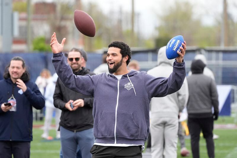 USC quarterback Caleb Williams reacts after a throw during an NFL Football Play Football Prospect Clinic with Special Olympics athletes, Wednesday, April 24, 2024 in Detroit. (AP Photo/Carlos Osorio)