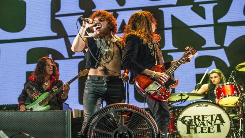  In this Dec. 8, 2018 file photo, Josh Kiszka, foreground left, and Jake Kiszka of Greta Van Fleet perform at the 2018 KROQ Absolut Almost Acoustic Christmas in Inglewood, Calif. The young Michigan rockers whose sound and classic rock look is reminiscent of Led Zeppelin are nominated for four Grammy Awards.  