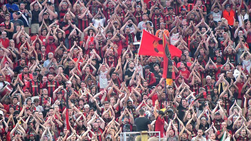 September 16, 2017 Atlanta - Atlanta United fans cheer in the first half of an MLS soccer match at the Mercedes-Benz Stadium on Saturday, September 16, 2017. HYOSUB SHIN / HSHIN@AJC.COM