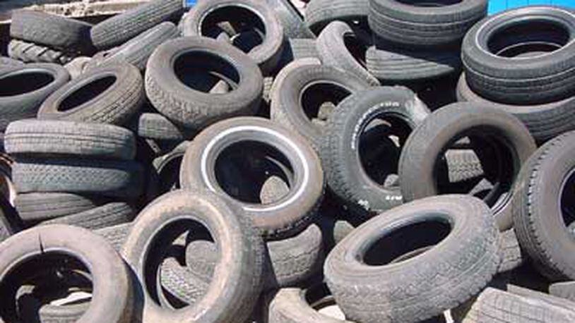 A file photo shows a pile of scrap tires. A recent order from the Georgia Public Service Commission allows scrap tires and even natural gas to be added to the mix that biomass energy producers could burn to produce electricity.