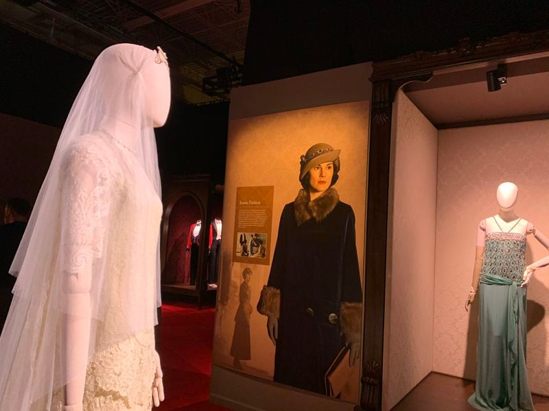 "Downton Abbey: The Experience" in Sandy Springs features more than 50 costumes from the show itself. The exhibit runs through mid January, 2022. RODNEY HO/rho@ajc.com