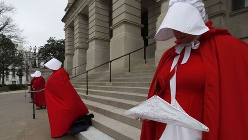 Georgia members of the Handmaid Coalition protested against House Bill 481 outside the state Capitol on Friday. Now that the House has passed HB 481, the Senate is now tasked with tackling legislation that would ban most abortions after six weeks. The House approved the legislation late Thursday, and advocates on both sides of the issues have already begun pushing senators to vote their way. Bob Andres / bandres@ajc.com
