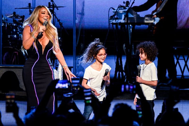 Mariah Carey performs onstage with Monroe Cannon and Moroccan Cannon during the the Caution World Tour at Fox Theater on March 5, 2019 in Atlanta. (Photo by Kevin Mazur/Getty Images for Live Nation)