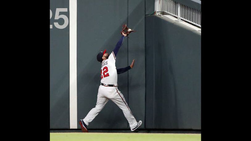 Right fielder Nick Markakis and the rest of the Braves’ outfielders have played a little deeper this year in the first season of intensive use of defensive analytics by the team. (AP Photo/John Bazemore)