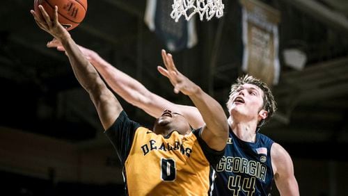Georgia Tech center Ben Lammers (44) breaks up an attempted layup by Wake Forest guard Brandon Childress (0) in an NCAA basketball game Saturday, Feb. 4, 2017, in Winston-Salem, N.C. (Allison Lee Isley/The Winston-Salem Journal via AP)