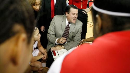 Georgia Lady Bulldogs coach Andy Landers huddles his team during a timeout against the Tennessee Lady Vols at Stegeman Coliseum in Athens on Thursday, Jan. 21, 2010. (Curtis Compton, AJC file photo)