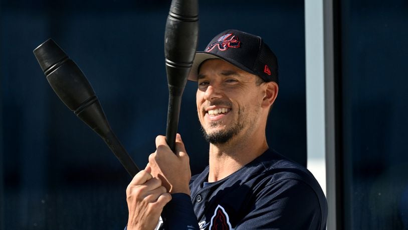 Braves starting pitcher Charlie Morton (50) smiles as he warms up during Braves spring training at CoolToday Park, Saturday, Feb. 18, 2023, in North Port, Fla.. (Hyosub Shin / Hyosub.Shin@ajc.com)