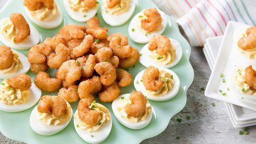 This creative new take on the classic deviled egg dish takes a total of 20 minutes to prep and cook, and serves 12.