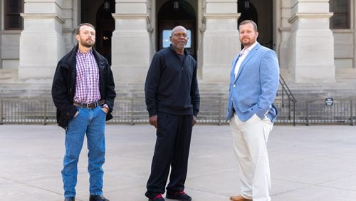 Lee Clark, from left, Terry Talley and Joey Watkins were all men wrongfully convicted and served more than 20 years in prison before being exonerated. They visited the Capitol earlier this month to drum up support for bills that would compensate them for the years lost. (Arvin Temkar / arvin.temkar@ajc.com)
