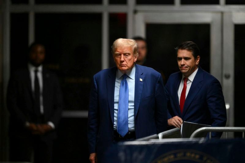 Former President Donald Trump walks to speak to the media at the end of the day of his hush money trial, in New York, Thursday, May 9, 2024. (Angela Weiss/Pool Photo via AP)