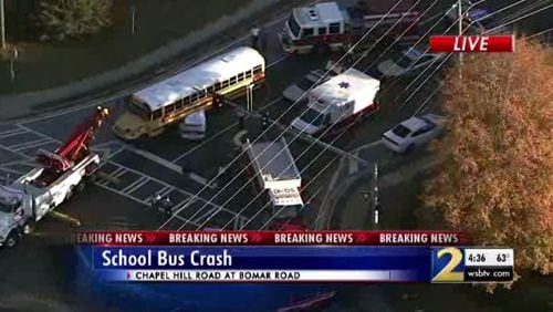 The driver of this white car was killed in a crash with a school bus in Douglasville on Monday.