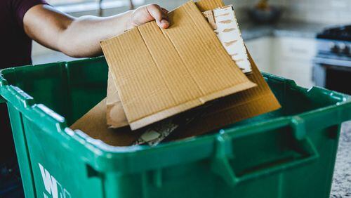 According to Waste Management, break down cardboard boxes before it heads into the bin. "Not only will the broken down box create more space in your container, but this ensures overall efficiency for recycling." Courtesy Waste Management