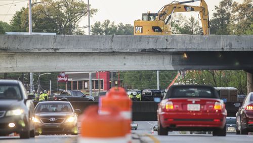 With the I-85 bridge collapse continuing to snarl traffic, Uber and IKEA are offering discounts to make the trip easier, or at least worth it. John Spink/AJC