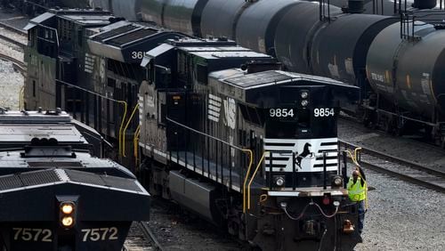 FILE - Norfolk Southern locomotives are moved through the Conway Terminal in Conway, Pa., June 17, 2023. Norfolk Southern shareholders will decide Thursday, May 9, 2024, whether to back an activist investor’s bid to take over the railroad’s board and replace management. (AP Photo/Gene J. Puskar, File)