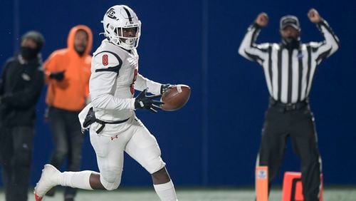 Lee County wide receiver Jevelle Furgerson (8) scores a touchdown during the second half of his Class 6A state high school football final December 29, 2020 in Atlanta. (PHOTO/Daniel Varnado)