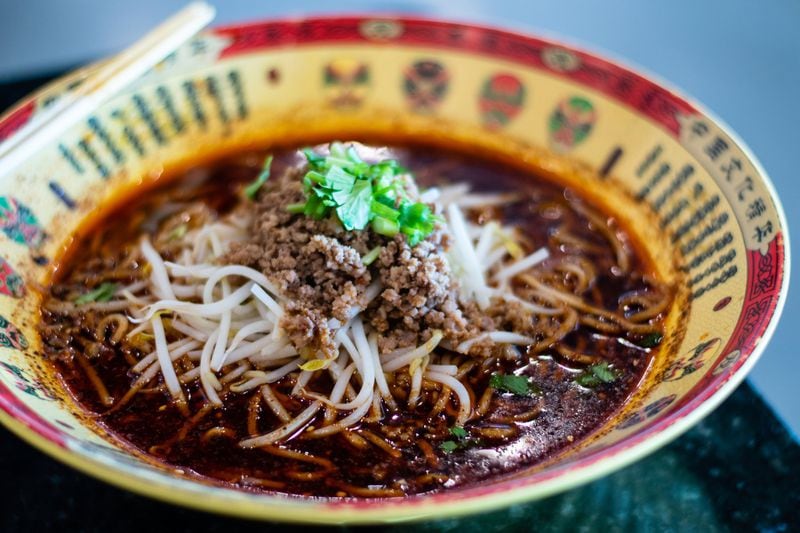 A steaming bowl of spicy chong qing noodles from Uncle Zhu Spicy Hot Pot in the Jusgo Food Court will give you plenty of flavor to savor. CONTRIBUTED BY HENRI HOLLIS