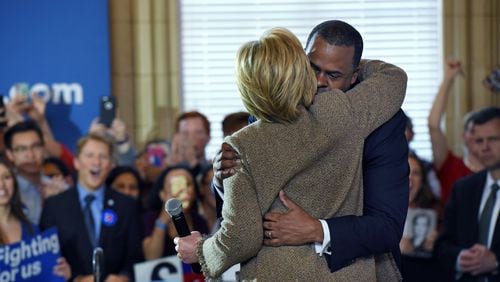 Hillary Clinton hugs Atlanta Mayor Kasim Reed in February 2016. HYOSUB SHIN / HSHIN@AJC.COM
