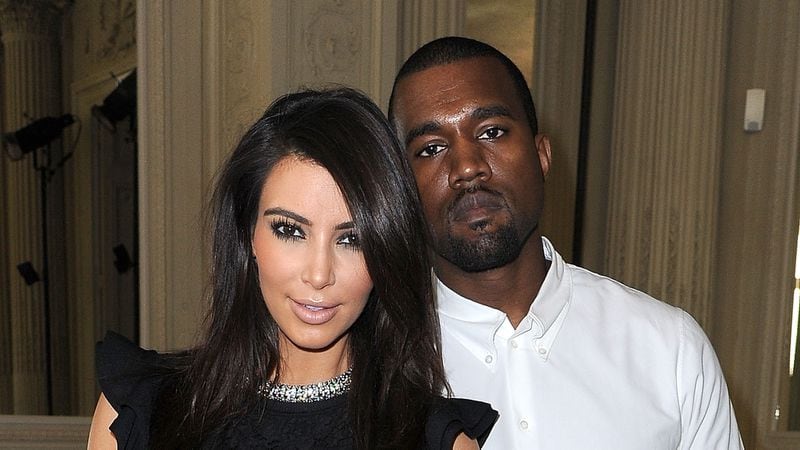 PARIS, FRANCE - JULY 04:  Kim Kardashian and Kanye West attend the Valentino Haute-Couture show as part of Paris Fashion Week Fall / Winter 2012/13 at Hotel Salomon de Rothschild on July 4, 2012 in Paris, France.  (Photo by Pascal Le Segretain/Getty Images)