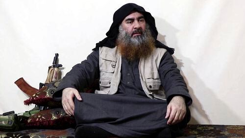 This file image made from video posted on a militant website April 29, 2019, shows the leader of the Islamic State group, Abu Bakr al-Baghdadi, being interviewed by his group's Al-Furqan media outlet.