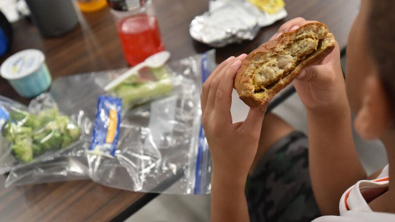 Children in DeKalb can get free breakfast and lunch at school sites through July 22. (HYOSUB SHIN / HSHIN@AJC.COM)