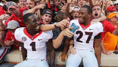 Everyone seems quite happy and content with the work done by Georgia running backs Sony Michel (left) and Nick Chubb. (Curtis Compton/ccompton@ajc.com)