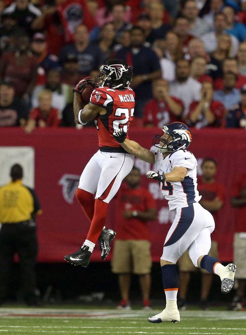 Jason Getz Atlanta Falcons cornerback Robert McClain (27) intercepts a pass in front of Denver Broncos wide receiver Brandon Stokley in the first half of their game against the Atlanta Falcons in the Georgia Dome Monday night in Atlanta, Ga., September 17, 2012. The Falcons intercepted Peyton Manning three times in the first quarter.