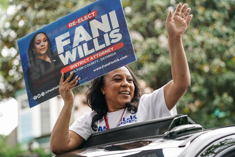 Fulton County District Attorney Fani Willis rides in a car while participating in the Inman Park Parade on Saturday, April 27, 2024, in Atlanta. (Elijah Nouvelage for The Atlanta Journal-Constitution)