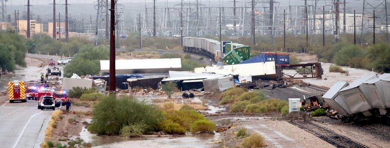 A Union Pacific train derailed on the east side of Interstate-10 just north of Twin Peaks Road in Marana, Ariz., Tuesday, July 10, 2018. Northwest Fire District officials say about 20 cars went off the rails as a strong storm was going through the Marana area near Interstate 10.