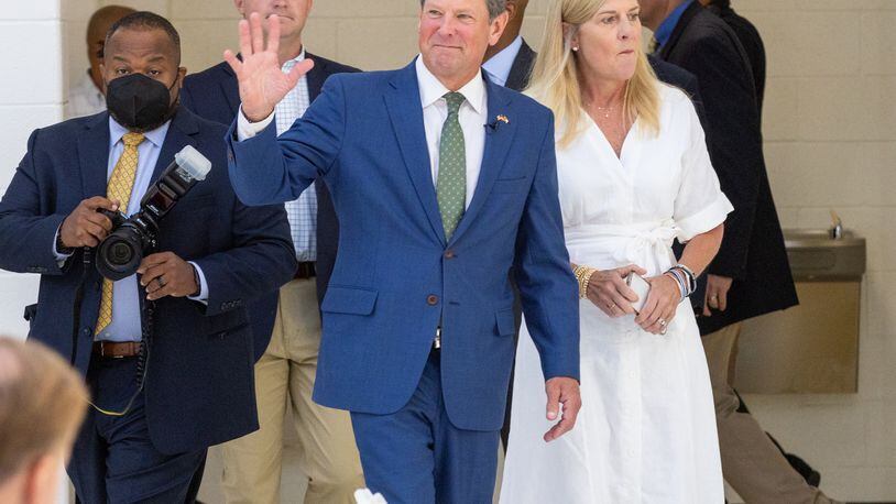 Governor Brian Kemp and First Lady Marty Kemp greet supporters before a press conference at Ola High School in Henry County on Friday, July 29, 2022. (Steve Schaefer / steve.schaefer@ajc.com)