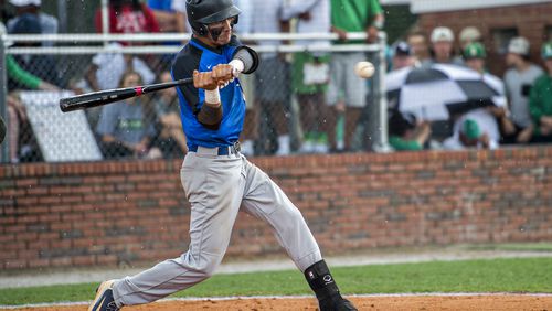 Locust Grove's Odlanier Rodriguez connects with the ball during their game against Buford during the GHSA Class AAAA Championship Baseball Tournament in Buford on Saturday, May 21, 2016. JONATHAN PHILLIPS / SPECIAL