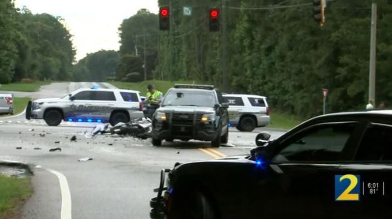 A motorcycle rider was killed after slamming into a patrol vehicle Friday afternoon in Tyrone. Georgia State Patrol troopers investigated the crash. Two officers suffered minor injuries.