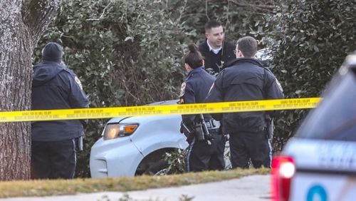 The victim was found dead about 4:30 a.m. when Gwinnett County police responded to a crash in the front yard of a Rockbridge Road home. (John Spink / John.Spink@ajc.com)