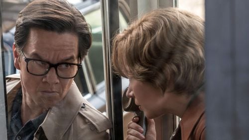 Michelle Williams (right) and Mark Wahlberg star in TriStar Pictures’ ALL THE MONEY IN THE WORLD.