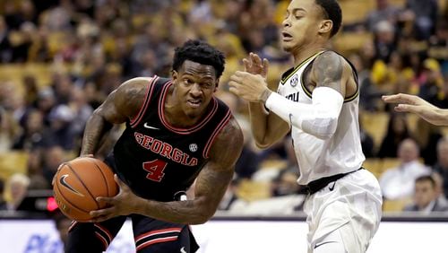 Georgia's Tyree Crump (left) heads to the basket as Missouri's Xavier Pinson defends during the first half of an NCAA college basketball game Tuesday, Jan. 28, 2020, in Columbia, Mo. (AP Photo/Jeff Roberson)