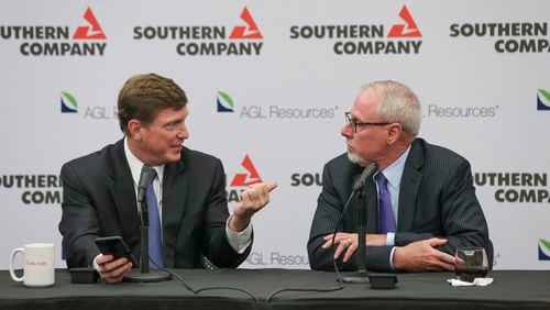 Tom Fanning Southern Company chairman (left) and AGL Resources chairman and CEO John W. Somerhalder II (right) officially announced the Southern Co. buying AGL Resources Inc. for approximately $8 billion on Monday, Aug. 24, 2015 at the Southern Company headquarters in downtown Atlanta. JOHN SPINK / JSPINK@AJC.COM