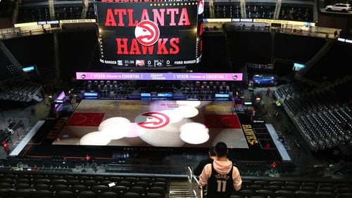 012721 Atlanta: An Atlanta Hawks fan arrives for the game against the Brooklyn Nets in an NBA basketball game on Wednesday, Jan. 27, 2021, in Atlanta.    Curtis Compton / Curtis.Compton@ajc.com”