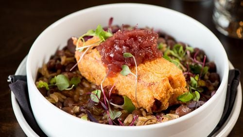 The chicken-fried pork belly with red beans, jasmine rice, and red onion jam is a meaty shareable offering at One Midtown Kitchen. CONTRIBUTED BY MIA YAKEL