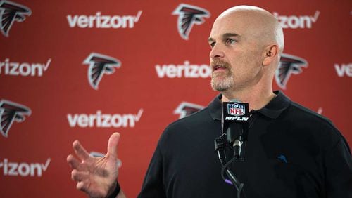 Dan Quinn speaks to the media at the team's practice facility earlier this month.