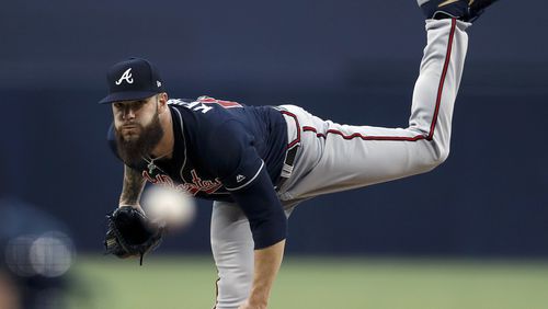 Atlanta Braves starting pitcher Dallas Keuchel works against a San Diego Padres batter during the first inning of a baseball game Friday, July 12, 2019, in San Diego. (AP Photo/Gregory Bull)
