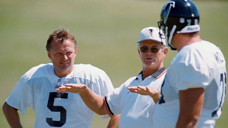 Atlanta Falcons coach Dan Reeves, center, speaks with kicker Morten Andersen (5), and center Dave Widell, right, during practice at the team’s training camp Wednesday, Sept. 9, 1998, in Suwanee, Ga. Reeves is hoping fan support for the team will rise after the team’s opening day victory over the Carolina Panthers. (AP Photo/Erik S. Lesser)