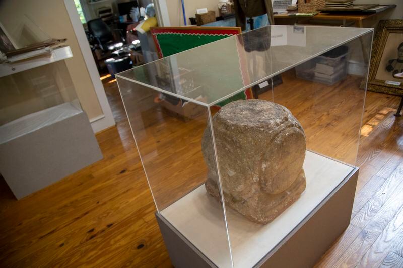 07/26/2021 — Newnan, Georgia — A headstone that was preserved from the Farmer Street Cemetery is on display at the Coweta County African American Heritage Museum and Research Center in Newnan, Monday, July 26, 2021. (Alyssa Pointer/Atlanta Journal-Constitution)