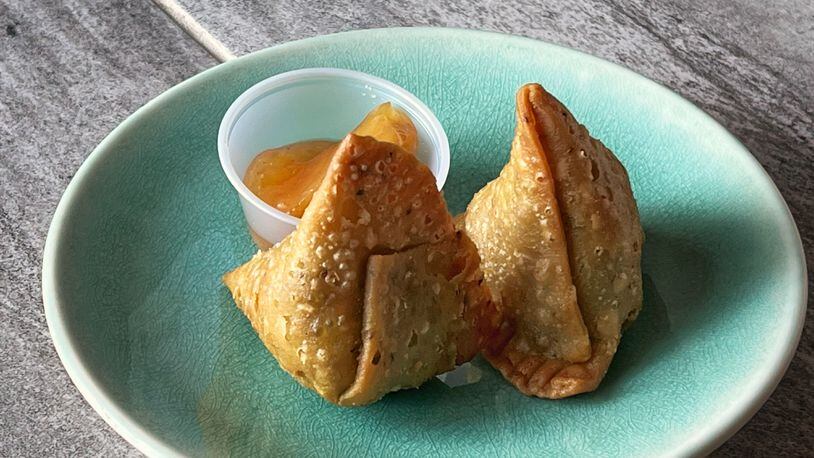 The duck samosas from Tabla deliver exciting flavor, while retaining all the characteristics you love most about the Indian dish. Henri Hollis/henri.hollis@ajc.com