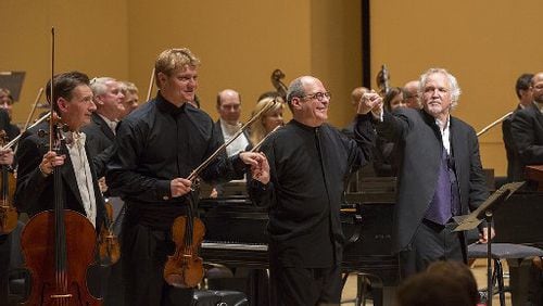 The Atlanta Symphony Orchestra's Christopher Rex (from left), David Coucheron and Robert Spano performed Beethoven's "Triple Concerto" in 2013 with Donald Runnicles conducting. CONTRIBUTED BY JEFF ROFFMAN
